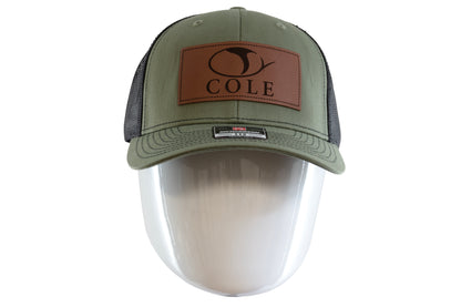 COLE HATS | 112 TRUCKER SNAPBACK-LEATHER PATCH-LODEN/BLACK/CARAMEL